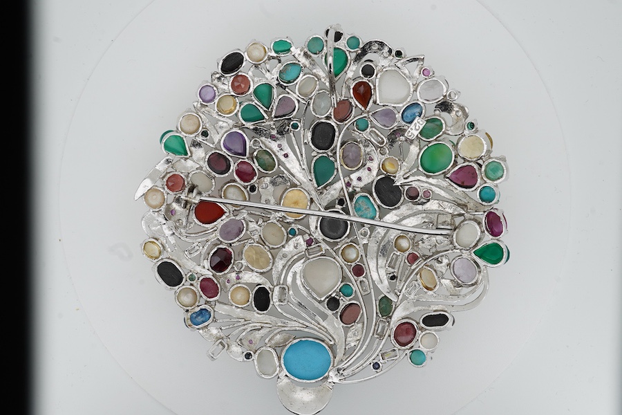 A large recent white metal (stamped 92.5) and multi gen set circular brooch, 89mm.